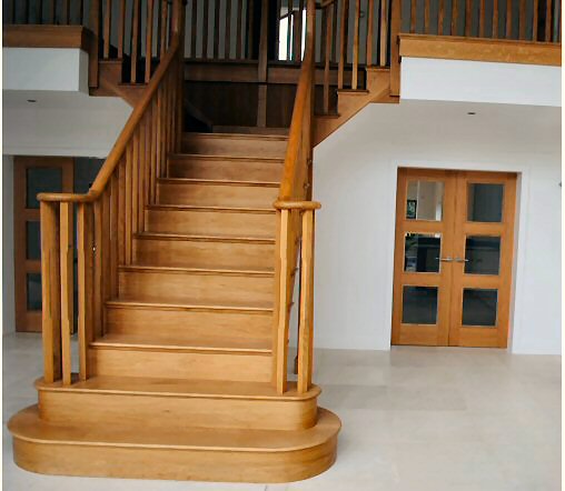 Modern swept stairs with oak treads
